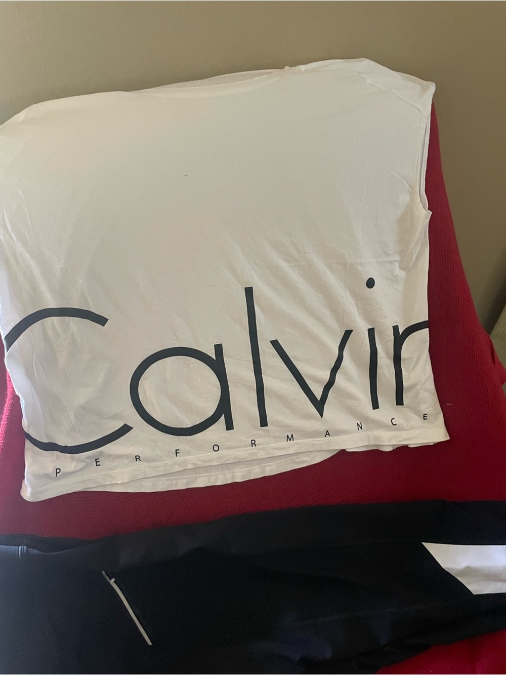 Calvin Klein White top and black bottom work together for a good workout session
